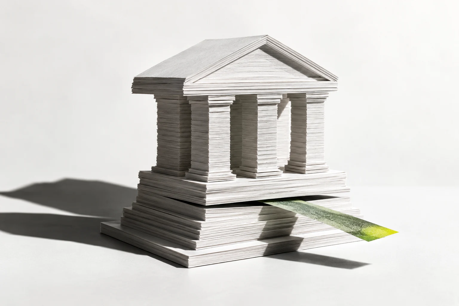 Conceptual paper bank with a loose strip beneath its columns